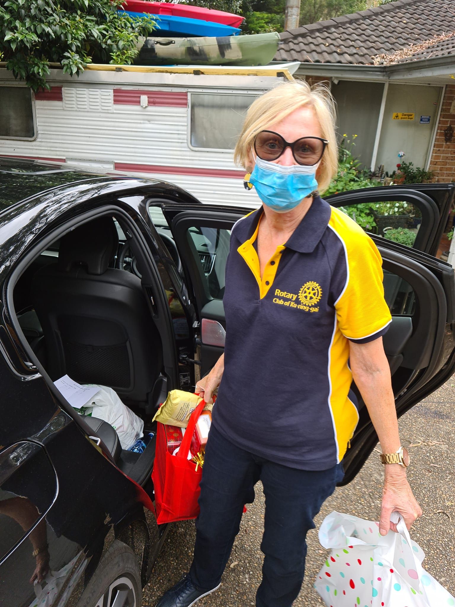 Volunteer Trish Delivering Christmas hampers