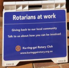 Rotarians at Work sign