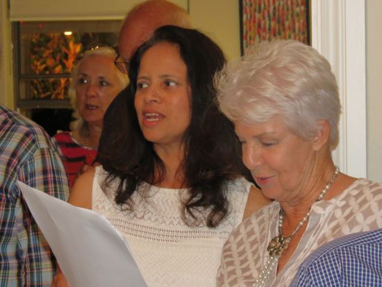 Ladies singing Christmas carols